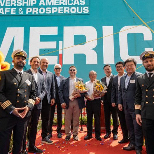 A group of people in front of the powership